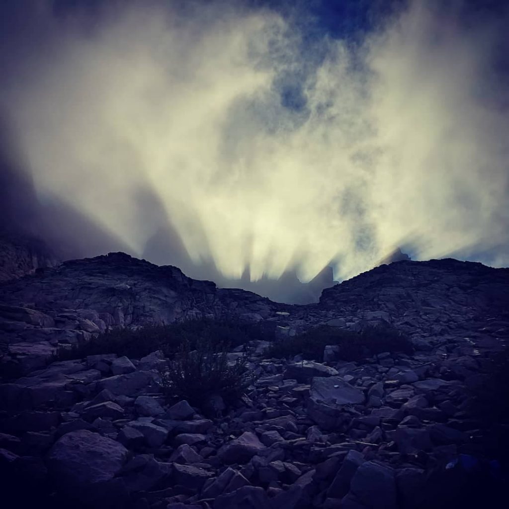 Sun light through mountains